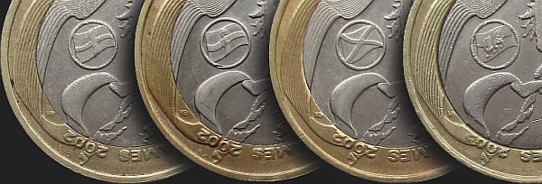 Różne flagi na rewersach monet 2 funty z 2002 Igrzyska Wspólnoty Narodów